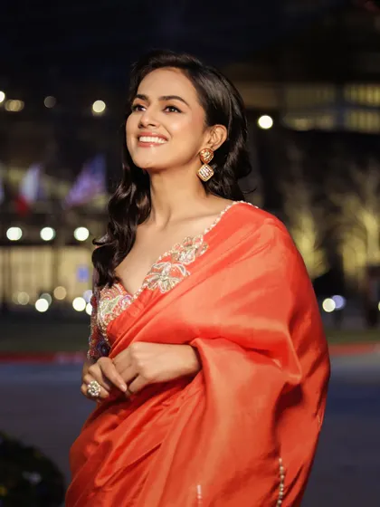 A candid, happy shot of Shraddha in the orange saree. The right outfit can truly make you shine from within.