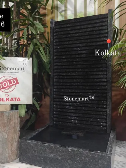 Another view of the 3-foot granite waterfall sold to the Kolkata office, showing its sleek and professional appearance.
