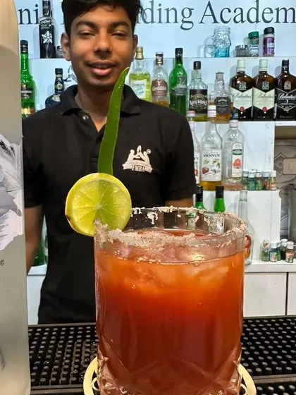 Our take on the classic Bloody Mary, made with Grey Goose vodka and garnished with a lime and chili. A perfect savory cocktail for brunch events.