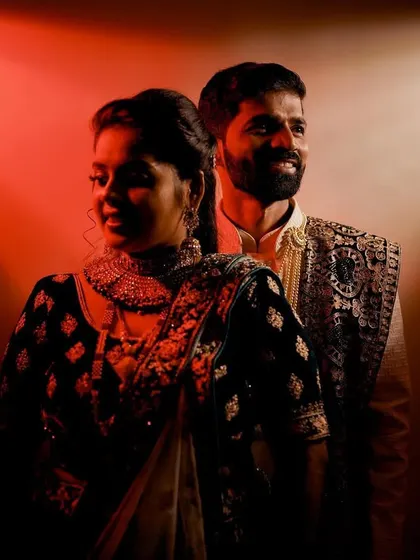 A creative portrait using dramatic red lighting. I love experimenting with light to create unique and moody shots for my couples.