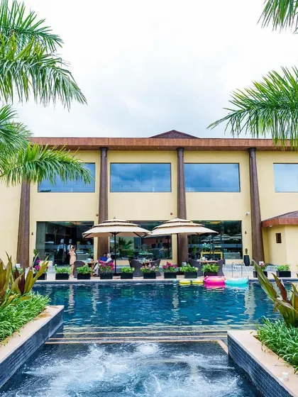Our poolside area, complete with an open-air jacuzzi, is a central hub of relaxation. The expansive layout ensures you can find both social spots and quiet corners to suit your mood.