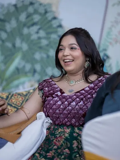 A candid shot from a henna ceremony that I'll never forget. The bride's happy smile is what makes this job so rewarding. It's a privilege to be part of such joyful moments.