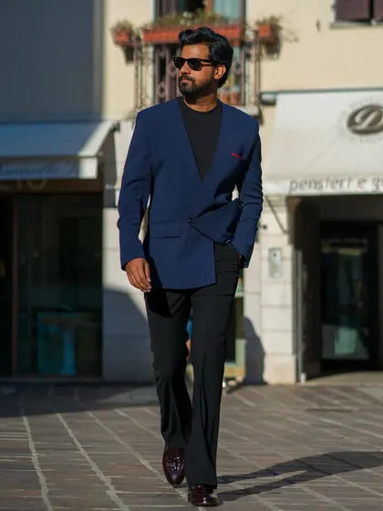 The clean, modern design of the lapel-free blazer is perfect for the minimalist gentleman.