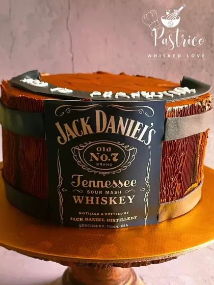 A Jack Daniel's barrel cake for the whiskey enthusiast, with a rich mocha flavour and realistic wood grain texture.