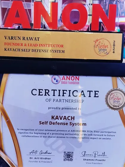 A close-up of the award and certificate of partnership from the ANON Global Foundation. We value our collaborations and the shared mission to create a positive impact.