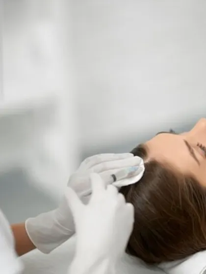 GFC treatment is a more advanced form of regenerative therapy, providing a higher concentration of growth factors. Here, a patient receives GFC injections, a procedure that often requires fewer sessions than traditional PRP to see visible results.