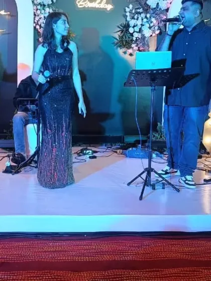 A closer shot of our singers entertaining the crowd at an event. We provide professional live music to make any celebration unforgettable.