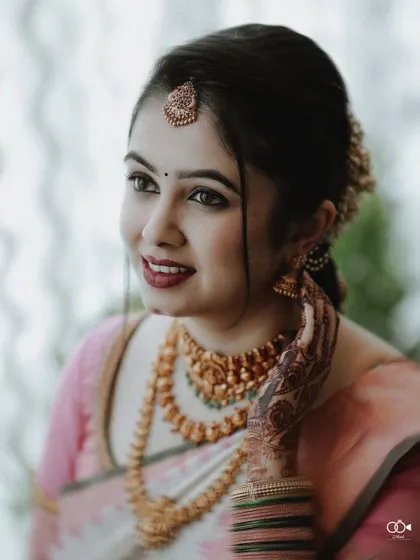 A duplicate of the beautiful close-up bridal portrait, highlighting her features and traditional jewelry.