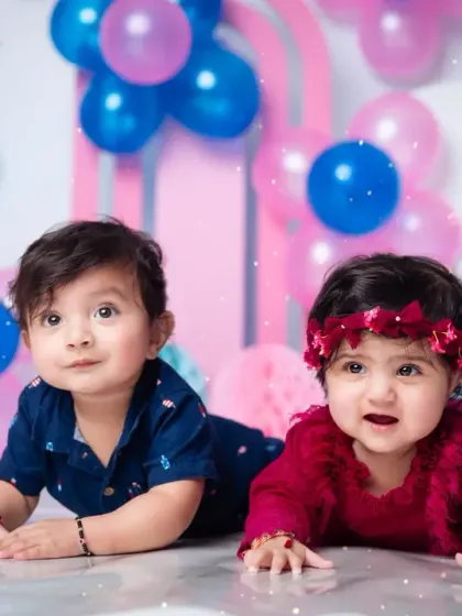Double the fun, double the cuteness! Capturing the individual personalities of these twins during their first birthday shoot.