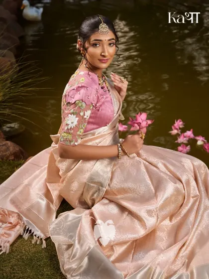 Another view of the Kamalam blouse, capturing its serene elegance by the water, a perfect reflection of the lotus motif.