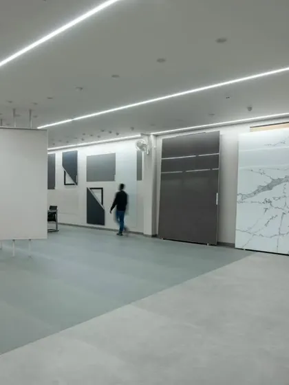 The Krsimar marble showroom, designed with a clean, minimalist aesthetic to let the stone slabs be the heroes. Linear lighting and an open layout create a gallery-like space for browsing.