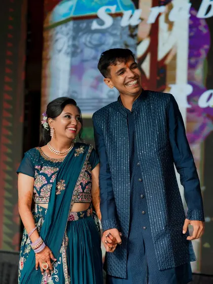 A happy, candid moment between the couple on the Sangeet stage. We love capturing the natural smiles and shared glances that happen between the main events.