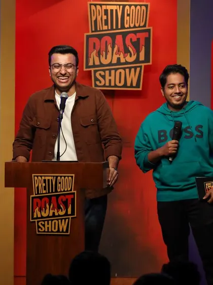 A collection of shots from the Pretty Good Roast Show, showcasing various comedians and moments from the event.