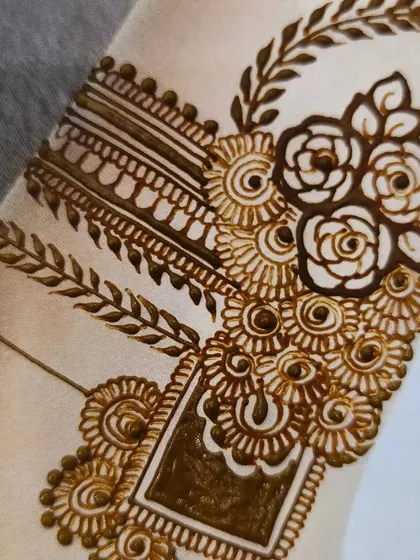 This close-up shows the intricate shading and line work used to create a three-dimensional effect in the floral patterns. These advanced techniques can make your designs truly pop.
