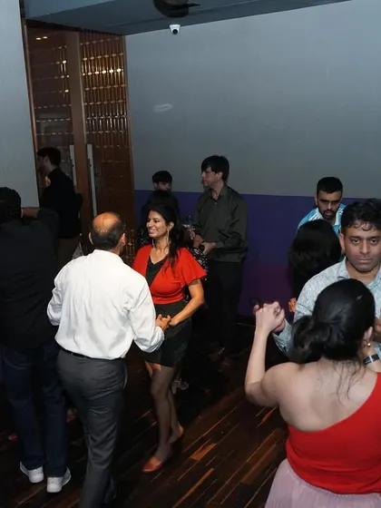 The dance floor was alive at our Christmas party. It was a perfect blend of festive cheer and Latin rhythms.