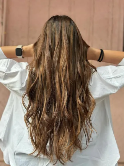 This mochaccino mane is on fleek. A beautiful non-bleach color for a bride-to-be, giving her a soft and romantic look. (No filter)