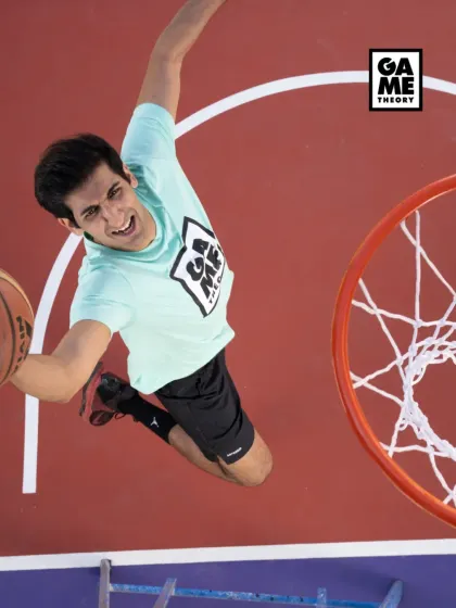 Take flight on our basketball courts. This action shot captures the energy and excitement of the game, showing a player going for a dynamic dunk. Our courts are built for moments like these.