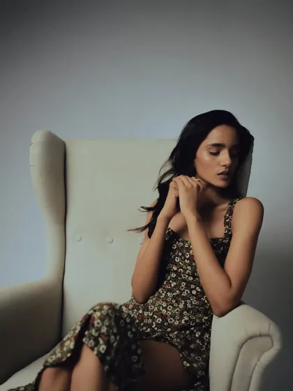 The understated makeup allows the model's expression and the mood of the photograph to take center stage.