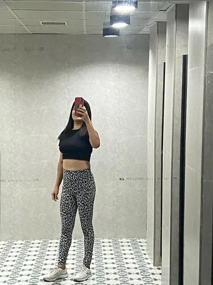 A quick mirror selfie after a good workout. Feeling strong and accomplished.