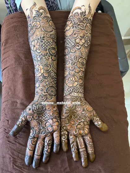 A full-coverage design with a focus on floral and leaf patterns, perfect for a bride who loves nature-inspired art.