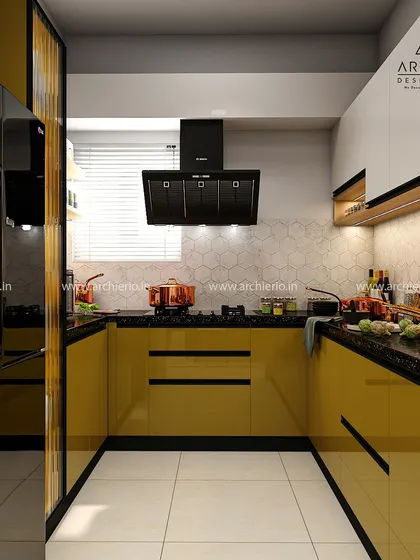 Another view of the mustard yellow kitchen, showing the U-shaped layout that maximizes counter space and storage. The glossy finish on the cabinets adds a sleek touch.