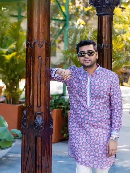 This festive season, I encourage making a statement with prints. This geometric-patterned kurta offers a bold yet traditional option for daytime functions.