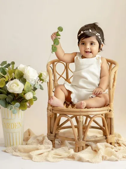 Cutie of the month. This little one, at her sitter session, is looking so sweet and stylish in her simple, elegant setup.