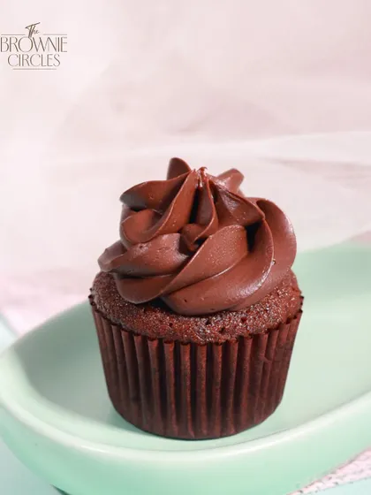 Sometimes, simple is best. Our Chocolate Ganache Cupcake is a humble yet deeply satisfying treat, featuring a rich chocolate cupcake with a smooth, decadent ganache frosting.