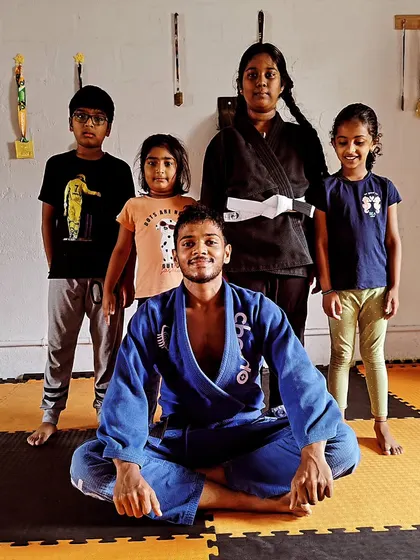 We believe martial arts is for everyone, starting from a young age. This is a group photo from our kids' summer camp. We focus on building discipline, confidence, and fundamental MMA skills in a fun and safe environment.