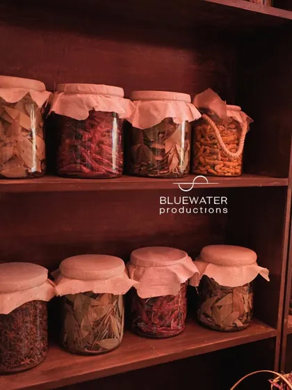 Jars filled with dried herbs and spices, a key detail in bringing the Dubai Souk theme to life.