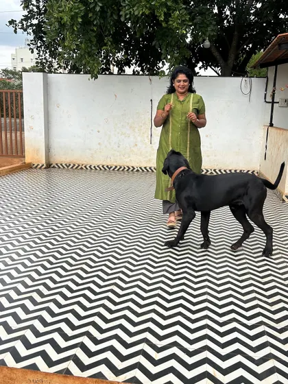 Playtime with one of our energetic black dogs. We ensure they get plenty of exercise.
