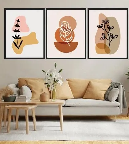 This set of three framed art prints features botanical leaves and abstract shapes in a neutral, earthy palette. They are perfect for adding a calm, organic feel to a living room, with customization available for the frame, paper, and size.