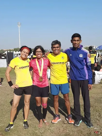 Posing with friends after the Ahmedabad race. We support each other's goals and celebrate each other's successes.