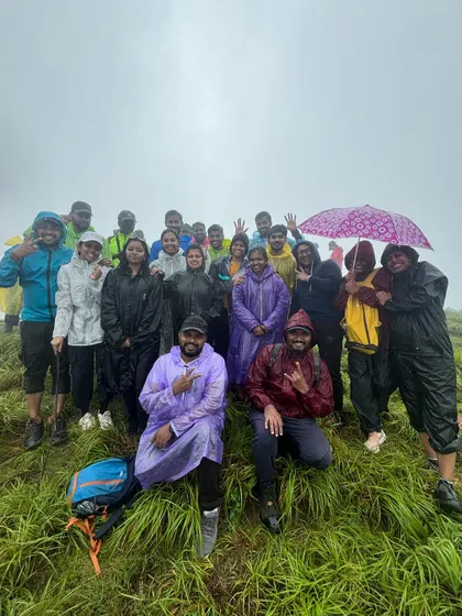 Another batch of happy trekkers at the summit of Gangadikal peak. The rain and fog just added to the adventure.