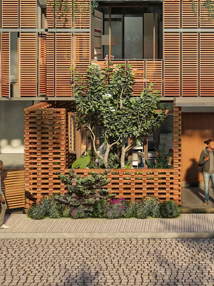 The entrance design for a dwelling unit, featuring a mix of solid and perforated wooden screens. This creates a semi-private threshold that feels both secure and connected to the street life outside.