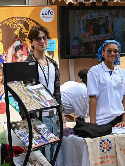 Students managing a booth at the French Charity Mela. We encourage our students to take active roles in our community events, building their confidence and organizational skills.