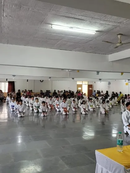 A moment of quiet discipline and respect as students sit in seiza, awaiting the start of the belt exam at our Silicon City dojo. The hall is filled with focus and anticipation.