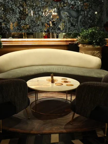 A view of the plush seating area inside the lounge, highlighting the unique decor and intimate setting perfect for a party.