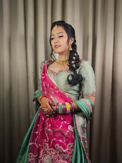 A beautiful portrait of Anjali during her Mayra ceremony. The makeup is subtle, with an emphasis on clean skin and defined eyes.