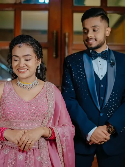 A lovely couple shot from Medhini's reception. Her makeup is soft and romantic, perfect for the occasion.