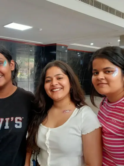 A group of happy clients showing off their glitter art. It's a fun activity to do with friends at any event.
