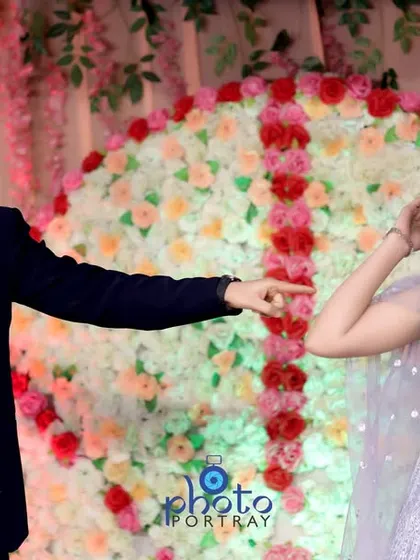 A fun and playful moment from the sangeet or engagement party, perfectly captured for the wedding album.