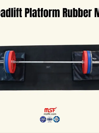 Our Deadlift Platform shown with a barbell and bumper plates, ready for a heavy training session.