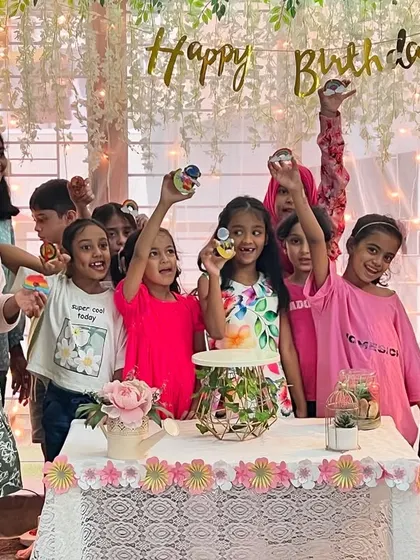 The grand finale of a wonderful birthday party. A group of proud artists holding up the beautiful princess figurines they painted. These smiles say it all.