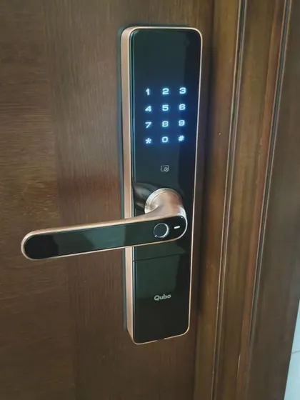 The sleek, vertical design of the Qubo smart lock integrates seamlessly with various door styles, providing a sophisticated and high-tech security upgrade.