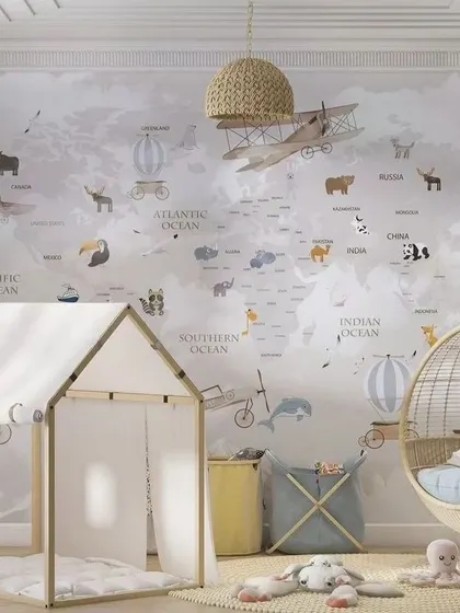 The world map wallpaper shown in a stylish kids' room setting.