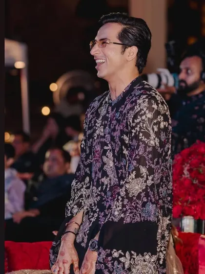 The groom's infectious smile as he enjoys the Sangeet night. We handle the stress so you can have all the fun.