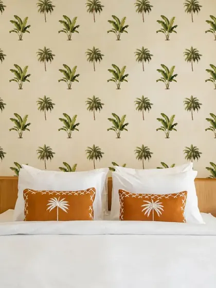 Our Banana and Palm Tree wall stickers create a serene and inviting feature wall in this bedroom. The design is perfect for creating a peaceful and relaxing sleeping environment.