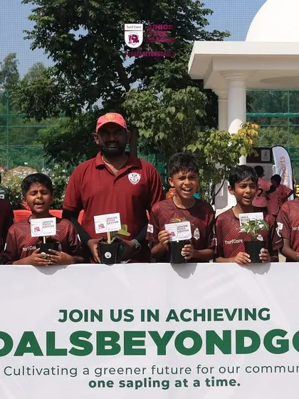 A team celebrates their tournament journey and their contribution to the community.