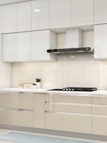 A spacious parallel kitchen with beige and white handleless cabinets for a sleek, modern look. The tall glass crockery unit on the left adds a touch of elegance and display storage.